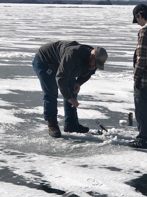 someone ice fishing